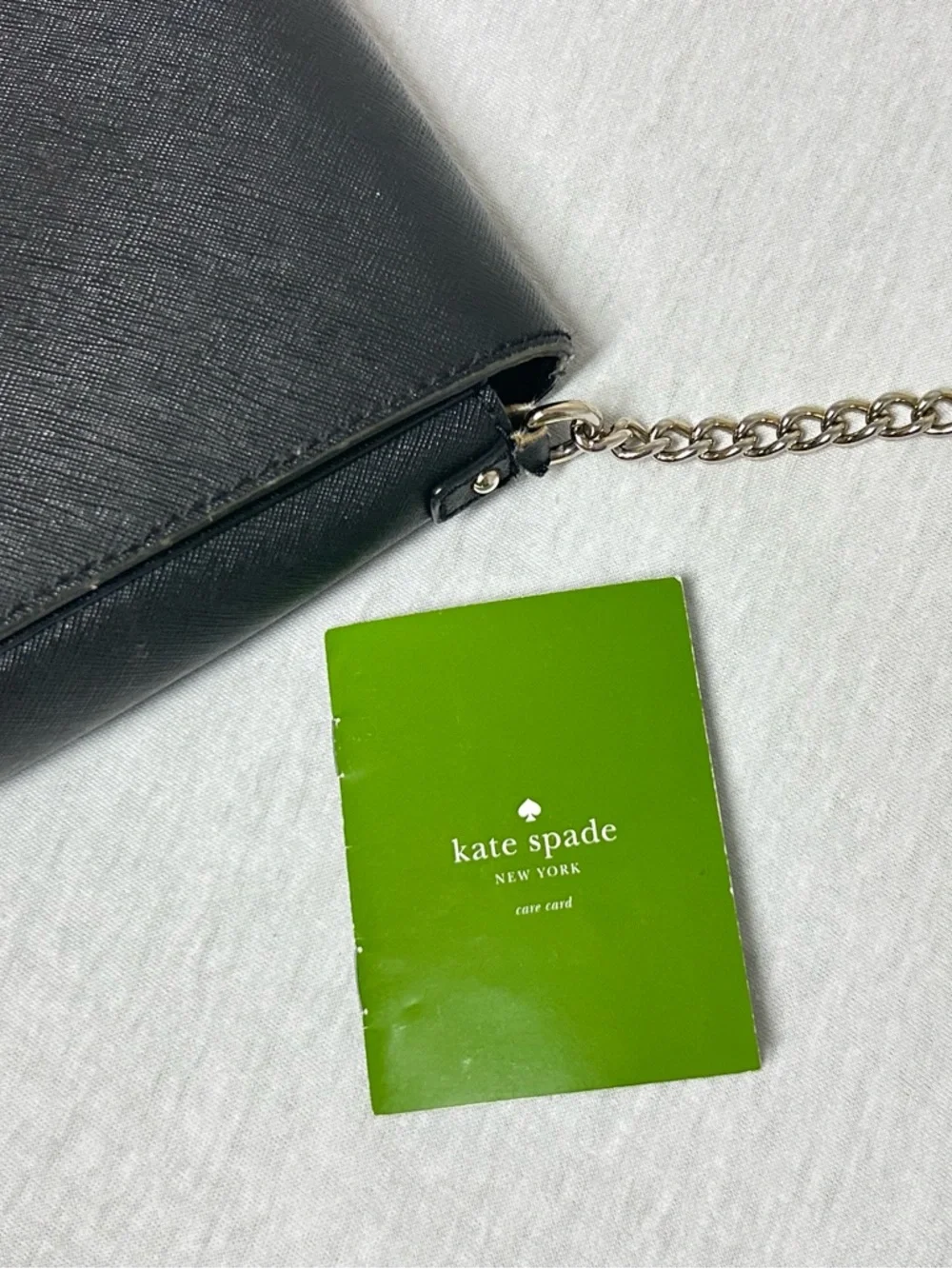 kate spade black leather crossbody with gold chain